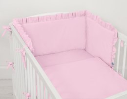 Uniwersalny ochraniacz z falbanką do łóżeczka niemowlęcego - różowy